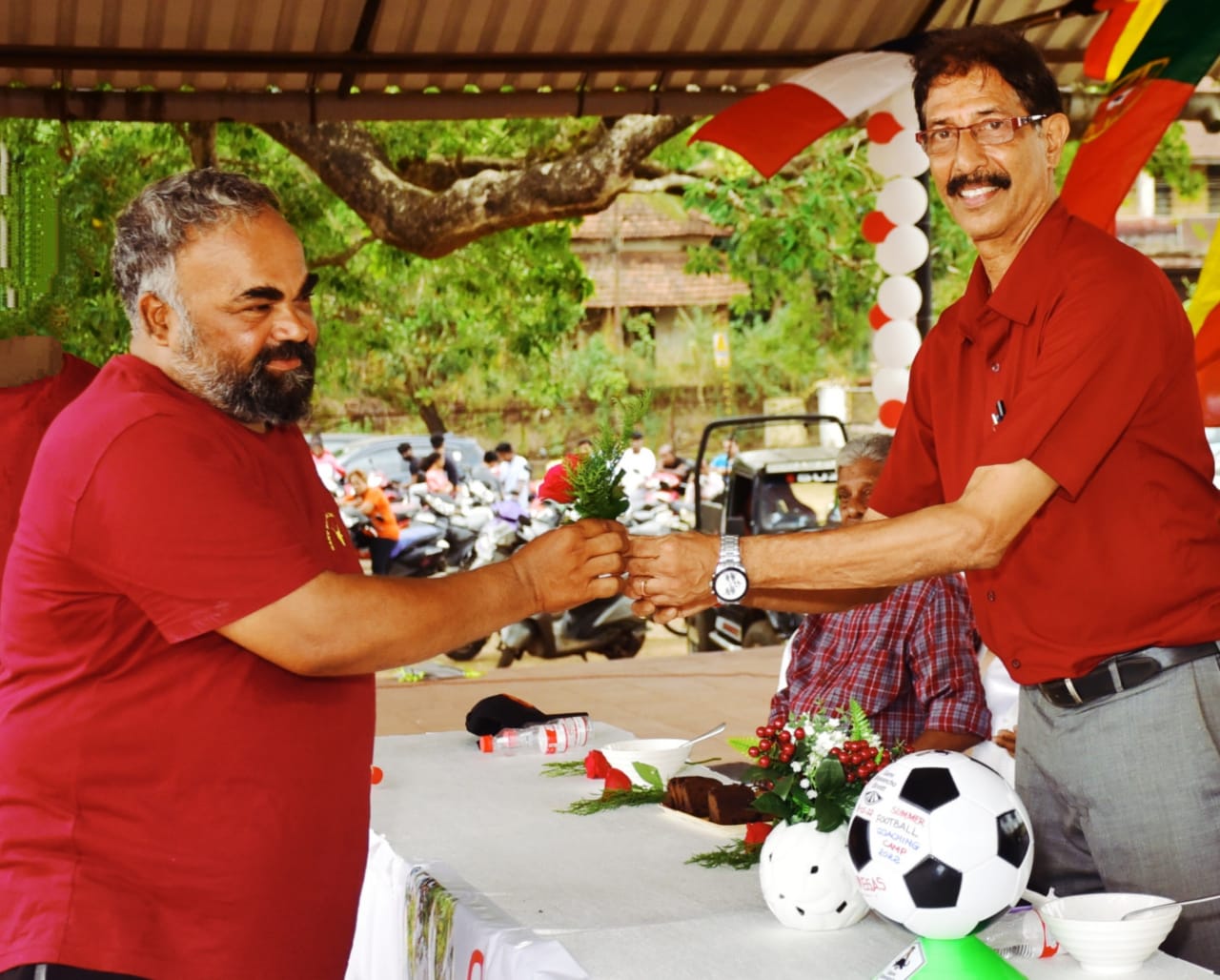 Brahamanand felicitating GBE member and football lover Menino alias Minush.jpeg